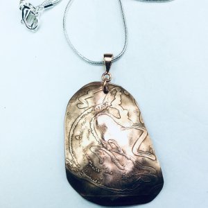 Copper etched dolphin, sterling silver snake chain