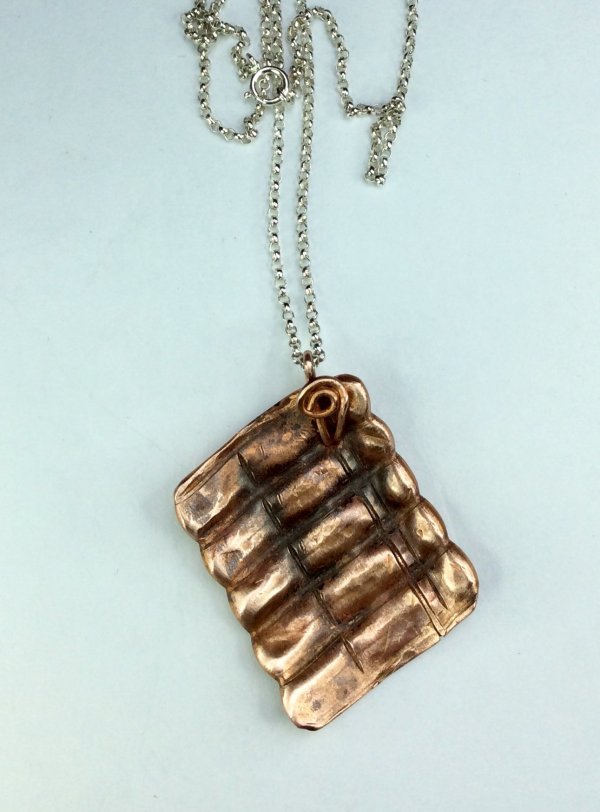 Copper ribbed pendant, sterling silver