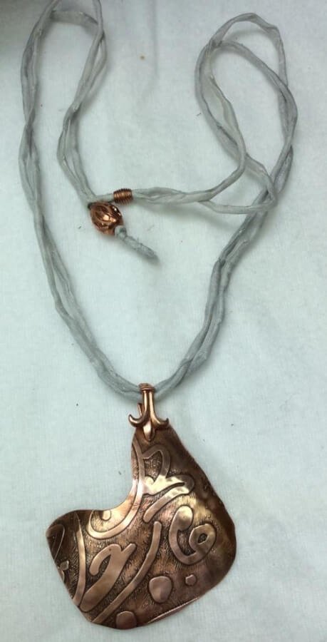 Etched copper pendant, silk